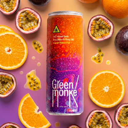 A can of Green Monke hemp THC-fused soda upright in the center, surrounded by sliced oranges, whole and halved passion fruits, and small drops of passion fruit syrup on a peach-to-purple gradient background.